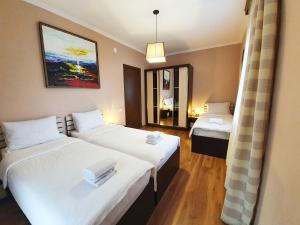 Кровать или кровати в номере ---Allegria House---