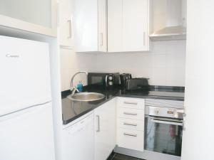 Kuchyň nebo kuchyňský kout v ubytování Carvoeiro Beach Apartment Luxury + 18 fotografií