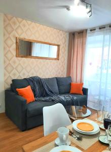 A seating area at Comfortable apartment in Las Americas, PH317 with pool next to the ocean