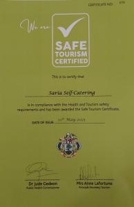um certificado verde com um logótipo certificado de turismo satélite em Saria Self Catering em Praslin