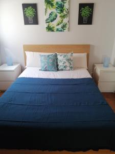 Un pat sau paturi într-o cameră la EL ATERPE