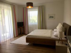 Postel nebo postele na pokoji v ubytování Appartements Käthe