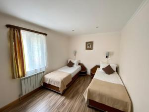 Postel nebo postele na pokoji v ubytování Alva Hotel & Spa + 37 fotografií