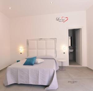 Posteľ alebo postele v izbe v ubytovaní Love inn