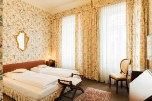 Postel nebo postele na pokoji v ubytování Das Kleine Hotel in ruhiger Stadtlage + 28 fotografií