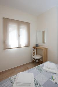 Postel nebo postele na pokoji v ubytování (Apt.1) Lofos Apartments in Vergia Halkidiki