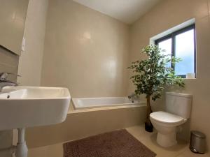 Ванная комната в Hepburn Holiday Apartment