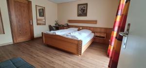 Voodi või voodid majutusasutuse Hotel Falknerei Galina toas