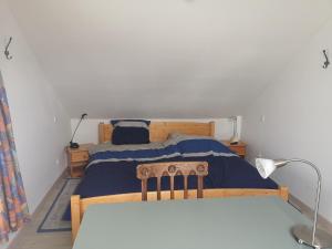 Postel nebo postele na pokoji v ubytování vieux colombier