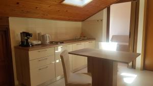 Kuchyň nebo kuchyňský kout v ubytování Apartment A&M