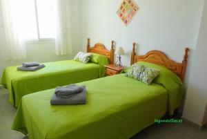 Posteľ alebo postele v izbe v ubytovaní Villa Aloe - chill in the sun!
