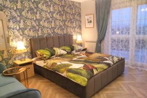 Кровать или кровати в номере Willa Anna Polańczyk