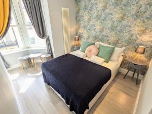 Кровать или кровати в номере Saltwater Guest House