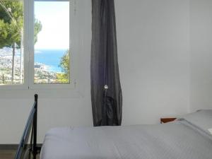 Posteľ alebo postele v izbe v ubytovaní Apartment Margi by Interhome