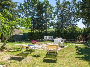 a group of chairs and tables in a yard at Holiday Home Masseria Difesa Grande by Interhome in Montenero di Bisaccia +37 photos