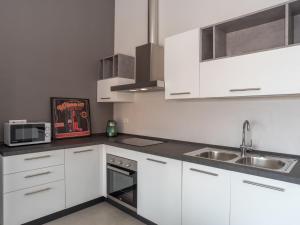 Kuchyňa alebo kuchynka v ubytovaní Apartment Asfodelo by Interhome