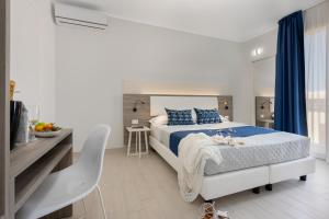 Letto o letti in una camera di Scrusciu du mari