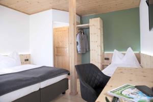 Ένα ή περισσότερα κρεβάτια σε δωμάτιο στο Landhof Lazarus