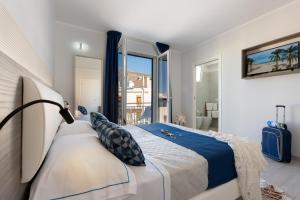 Letto o letti in una camera di Scrusciu du mari