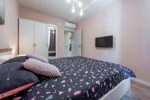 Postel nebo postele na pokoji v ubytování Apartment Glory
