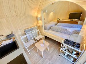 Postel nebo postele na pokoji v ubytování IGLUCAMPING Allgäu-Bodensee