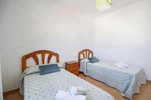 Postel nebo postele na pokoji v ubytování Apartamento La Higuera 4