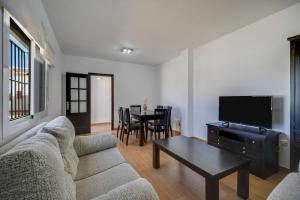 TV a/nebo společenská místnost v ubytování Apartamento La Higuera 4