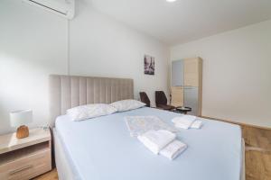 A bed or beds in a room at Top-Top