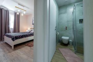 Koupelna v ubytování Apartment Glory + 37 fotografií