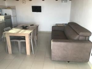 Kuchyň nebo kuchyňský kout v ubytování Terrazza sul golfo degli angeli