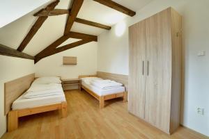 Postel nebo postele na pokoji v ubytování Pivovarský dvůr Lipan + 79 fotografií