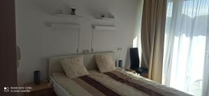 Posteľ alebo postele v izbe v ubytovaní Sunshine 208 apartman + 37 fotografií