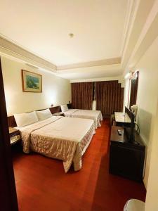 Postel nebo postele na pokoji v ubytování Family Hotel - Linsen