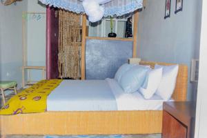 Katil atau katil-katil dalam bilik di Palm Garden Resort