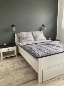 Posteľ alebo postele v izbe v ubytovaní Domek
