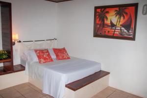 เตียงในห้องที่ Pousada Cacimbinha - ePipa Hotéis
