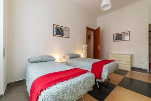 Ένα ή περισσότερα κρεβάτια σε δωμάτιο στο Piazza Bologna Comfortable Apartments