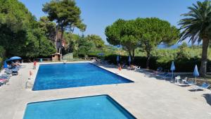 The swimming pool at or close to Residence Napoleon by HelloElba