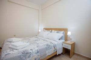 Postel nebo postele na pokoji v ubytování (Apt.3) Lofos Apartments in Vergia Halkidiki