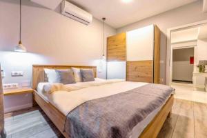 Ένα ή περισσότερα κρεβάτια σε δωμάτιο στο Apartment Dudanovski City Center - Apartment No. 4