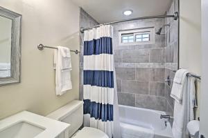 a bathroom with a toilet and a shower at Near Natl Park Hollywood Park Hot Springs Home in Hot Springs +16 photos