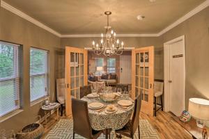a dining room with a table and chairs at Renovated Home with Screened-In Patio on Hwy 90! in Quincy