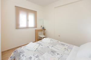 Postel nebo postele na pokoji v ubytování (Apt.3) Lofos Apartments in Vergia Halkidiki