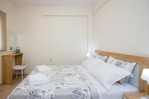 Postel nebo postele na pokoji v ubytování (Apt.3) Lofos Apartments in Vergia Halkidiki