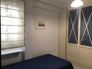 A bed or beds in a room at Almería Centro
