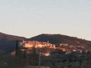 a town on top of a hill with houses at Mamma Giulia in Stroncone