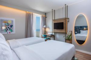 Postel nebo postele na pokoji v ubytování Mercure Rio Boutique Hotel Copacabana