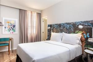 Postel nebo postele na pokoji v ubytování Mercure Rio Boutique Hotel Copacabana