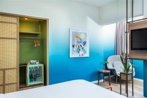 TV a/nebo společenská místnost v ubytování Mercure Rio Boutique Hotel Copacabana