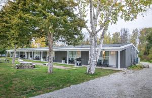 a building with trees in front of it at Boutique Suite #6 in Blue Mountains